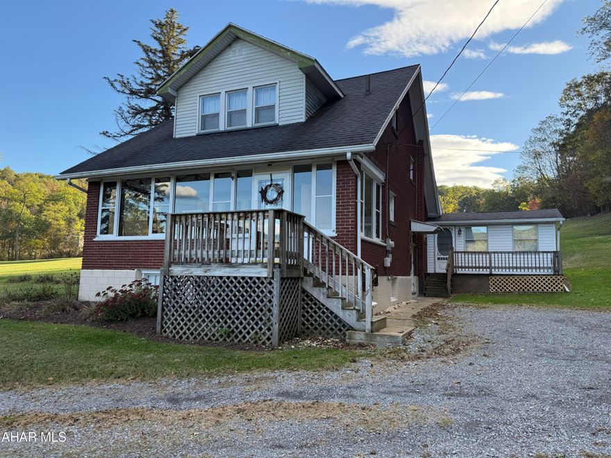 Charming one-and-a-half-story brick and vinyl home nestled on 8.65 peaceful acres on Cashman Road for sale in Altoona, PA. This inviting property combines privacy, space, and convenience—offering the perfect balance between country living and accessibility to town amenities.

Inside, you will find a warm and welcoming layout with comfortable living spaces, a bright kitchen, beautiful dining room, 4 bedrooms and 3 baths, ideal for family living or downsizing without compromise. The property also features an attached apartment, providing an excellent income-generating opportunity or the flexibility to easily open it up and create a spacious first-floor en-suite—perfect for multi-generational living or guests.
 The property's expansive acreage provides endless possibilities—whether you envision gardening, outdoor recreation, or simply enjoying the beauty of your own private retreat.
Please note settlement cannot occur until January 15, 2026, to allow for the seller's move-in date with Greystone Apartments.
Do not miss your chance to own this unique property offering endless potential on over eight acres in Altoona!
