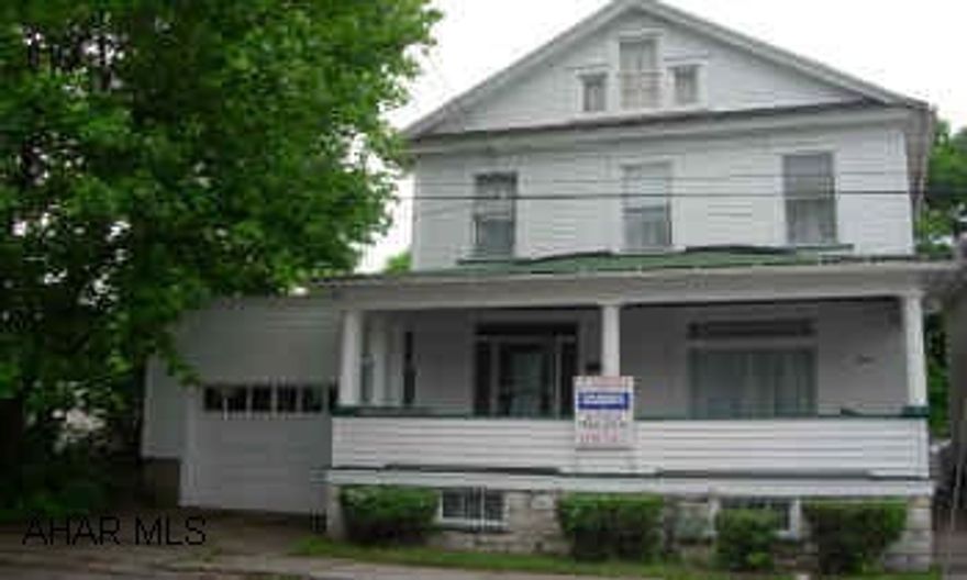 COVERED SIDE PORCH. NIC EYARD. LOTS OF KITCHEN CABINETS AND ELEC. RANGE. NEWER FURNCAE & HW TANK. EXTERIOR PAINTING IN 2003. SPACIOUS THROUGHOUT. ONE CAR ATTACHED GARAGE.