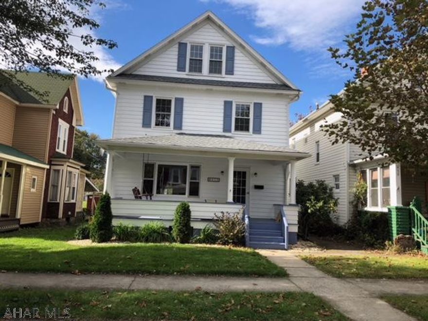 2 1/2 story Bellwood home w/ 3 bedrooms, 1.5 baths, new roof, detached garage & fenced yard