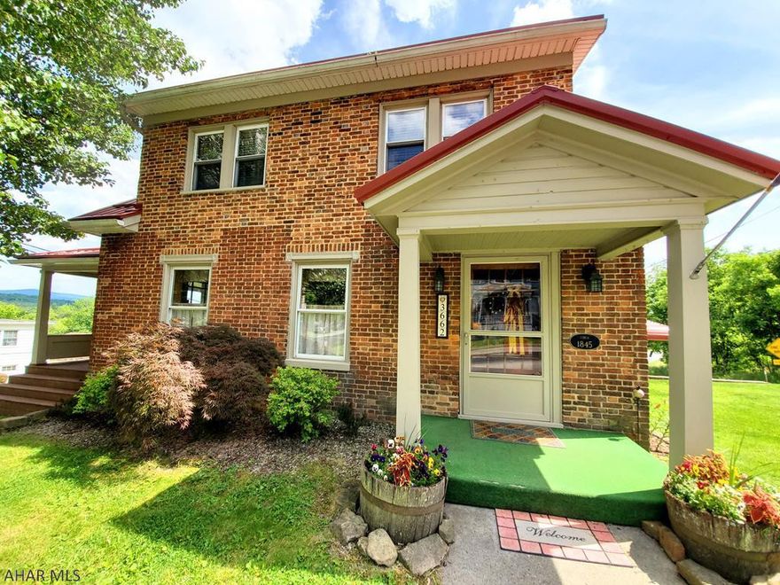 Beautiful house on corner lot located in Schellsburg Borough. Hardwood floors with recently installed new roof.  Pellet Stove insert in living room and 5 window A/C units included. Close to Shawnee Lake too!