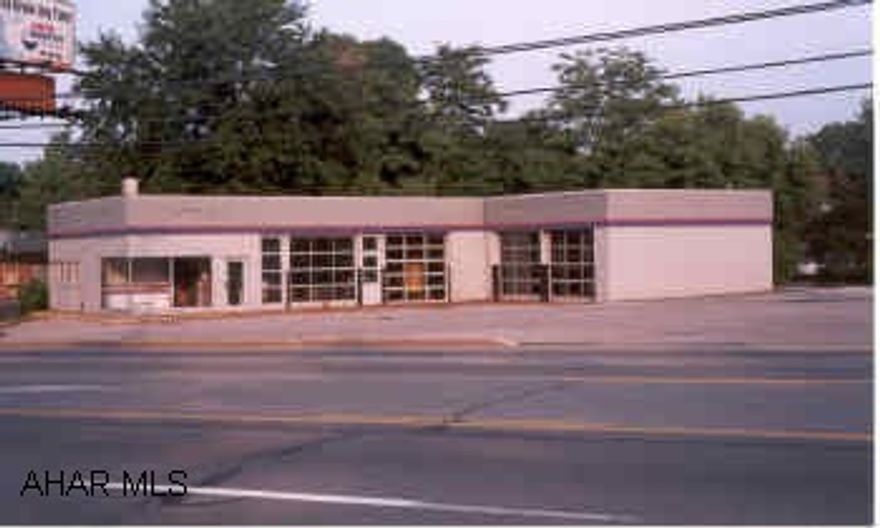 Midas Muffler Building. Old Service Station Old Service Station. Client unsure of Environmental Status. Property is Restricted Against Competitive Auto Repair