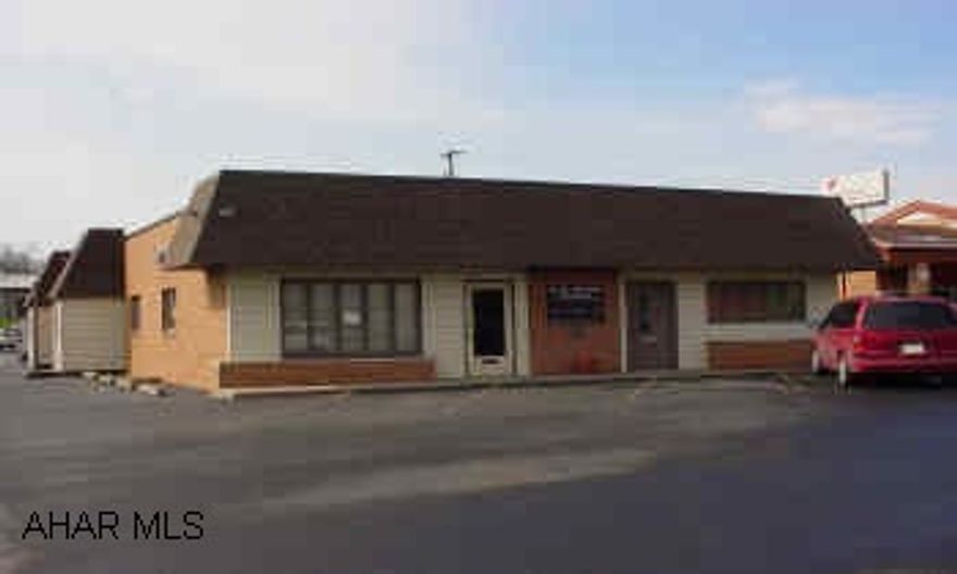 One story office building with great visibility along Pleasant Valley Blvd. Could be retail property. Has ample parking for many types of uses. Building is subdivided now for tenants to help pay for property!   Listing agent must attend showing!