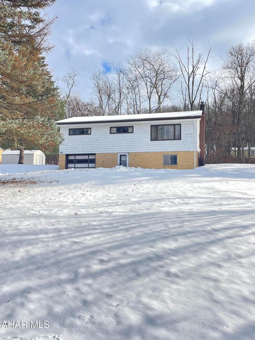 Location, location, location!! This 3 bed 2 bath home is situated on slightly over 1/2 acre in a quiet neighborhood on a cul-de-sac. Enter the home and you will find the large family room, laundry area and full bath. The main level offers a large eat in kitchen, living room, three bedrooms and full bath. With TLC, this solid home in Logan Township could be your perfect home!