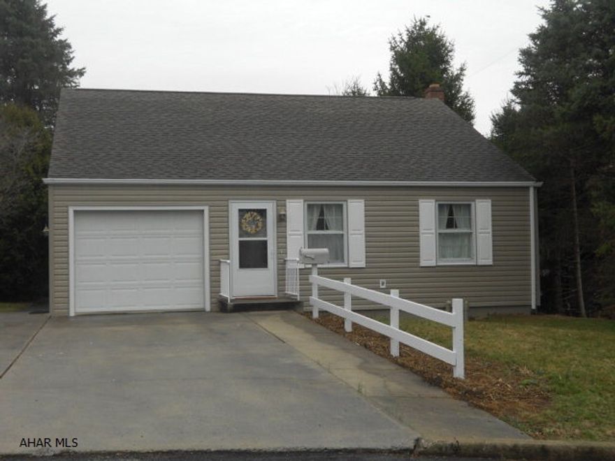 Surprises abound in this ranch home. Two bedrooms, 2 baths, nice lay out. New carpeting in living room and bedrooms. New vinyl siding, shutter and freshly painted interior. Electric baseboard heat. Rear enclosed porch offers peace and quiet. One car attached garage. Attic walkup storage that could be converted to extra bedrooms. Full unfinished basement. Appliances included.