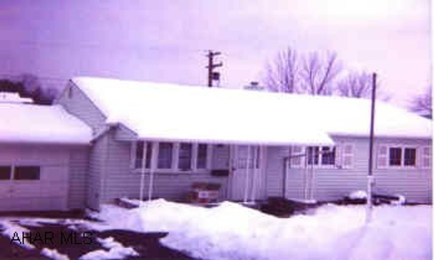 Immaculate Rancher Covered Front & Back Porch.