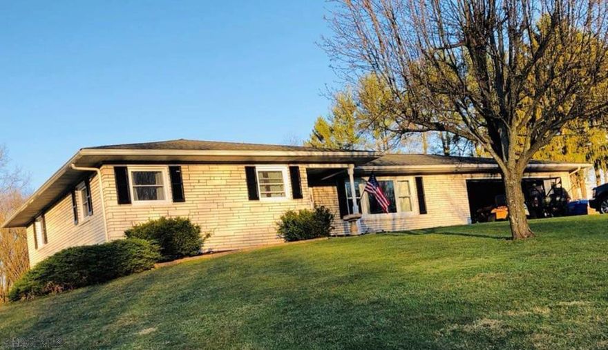 Well maintained brick home on over an acre of land offering three bedrooms and one bath with a partially finished basement, sunroom, integral garage and many new updates. The main floor of the home offers a living room, eat-in kitchen, three bedrooms, one bath, and a sun room. Outside you will find a rear patio with a fire pit, level yard, and shed. Call the Listing Agent today to schedule a showing!