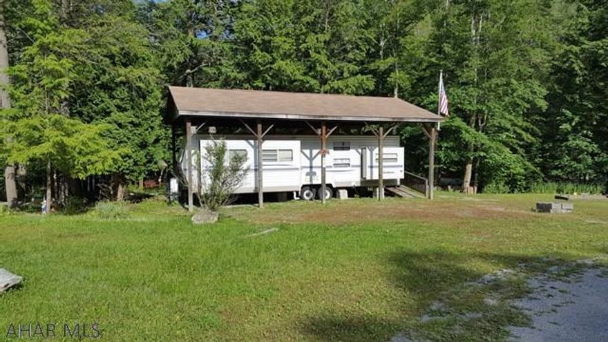 35' Coachmen camper on one lot in Glendale Yearound. Camper is under pavilion and also has a deck. Larger than normal campsite has creek right behind it. Shed included. Camper has been well kept and is clean.