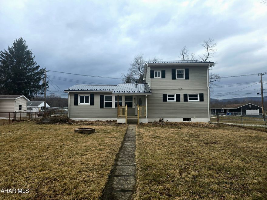 Bellwood School District stunner!!  This 3 bedroom 2 full bathroom home has been restored, renewed, and refreshed!  A brand new metal roof, furnace, breaker box, and water heater are just some of the things that make this home more than desirable.  The first floor features an open concept with 2 bedroom, 1 full bath, and laundry.  The second floor has an additional bedroom with private bathroom.  What are you waiting for?  Schedule your private showing!
