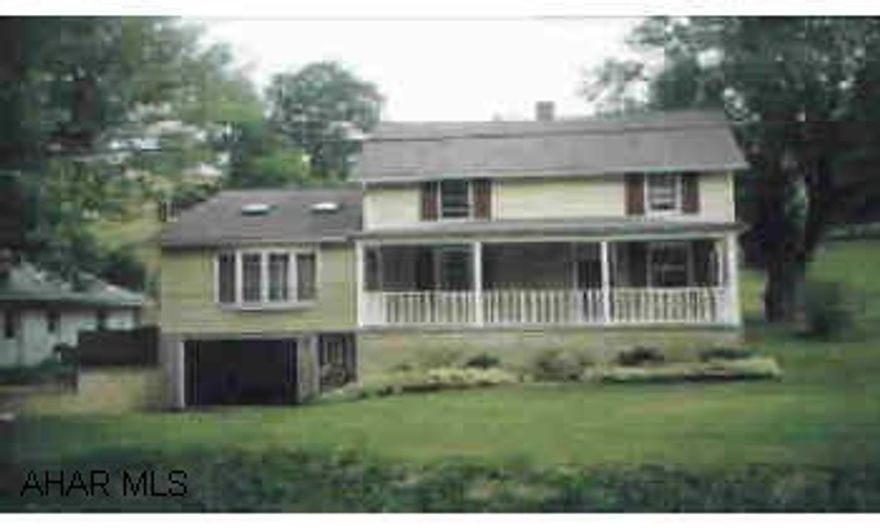 Nicely remodeled 2-story located at the bottom of Tull's Hill. Nicely remodeled 2-story located at the bottom of Tull's Hill.  Vaulted Ceilings.