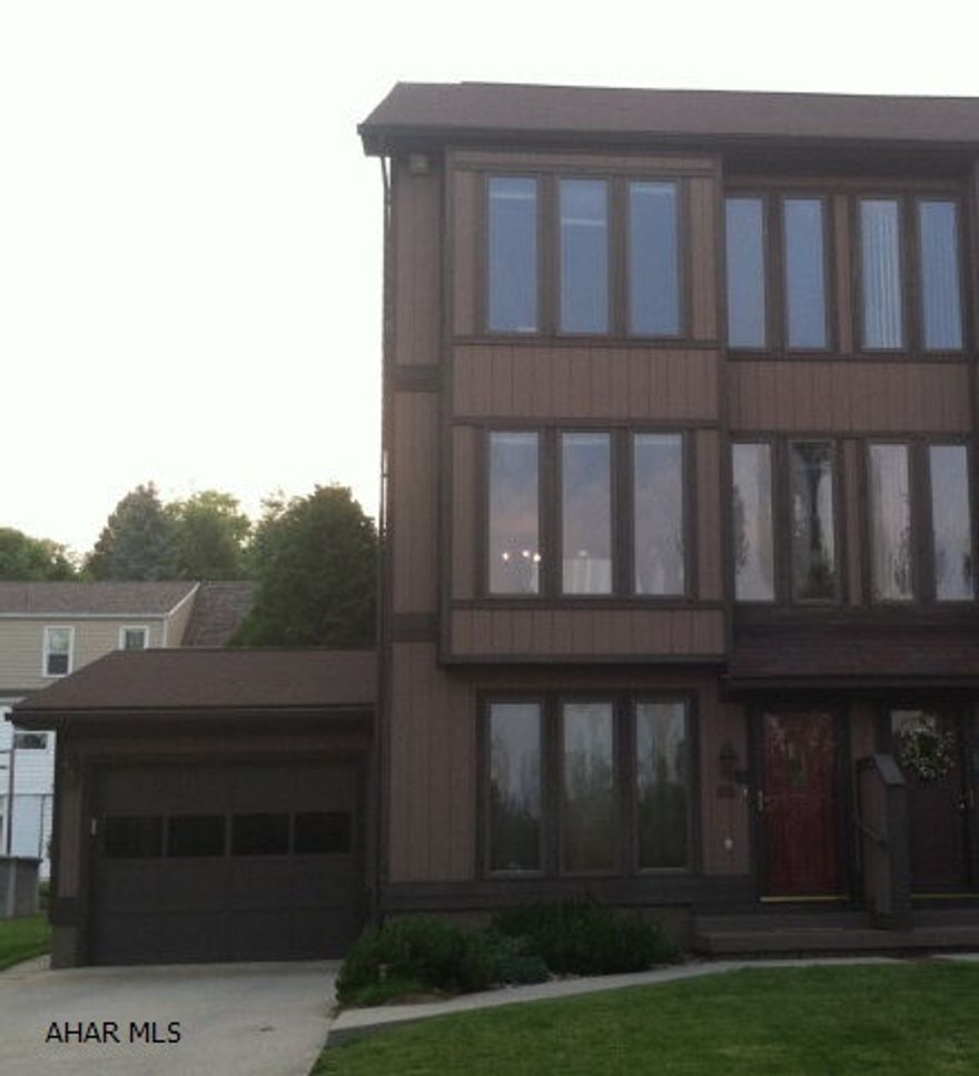 Lovely townhouse on a secluded street. Pristine interior with updates. The lower level has a large family room w/enclosed laundry, a nice size bedroom with sliding doors onto enclosed porch and a 3/4 bath off bedroom. On the second level huge living room w/optional dining area, eat in kitchen with sliding doors to enclosed porch to enjoy your coffee on. The third level has a master bedroom w large jack n jill bath and third bedroom/or office.