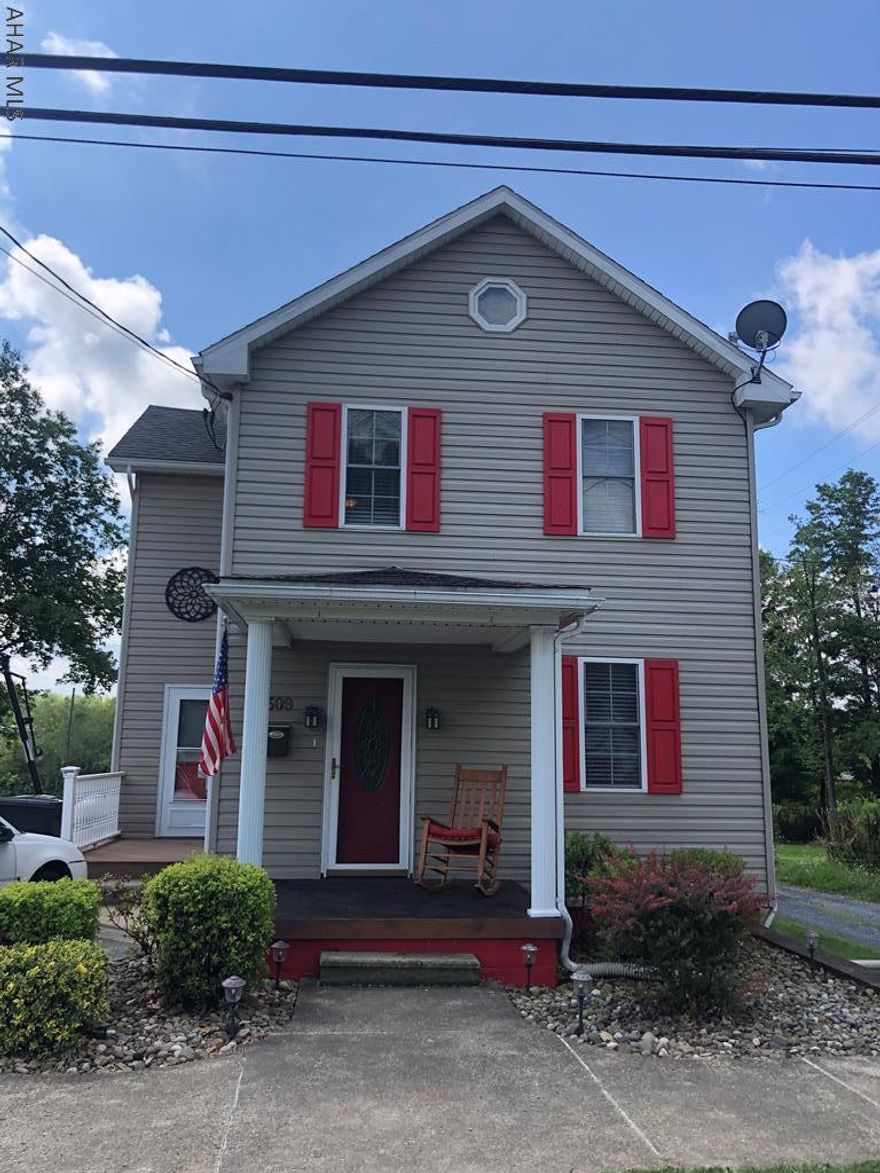 Where do I start with this property, it has been extremely well taken care of so there is nothing to do but move into this beautiful home.  New flooring with radiant heat in living room, family room and dining.  Kitchen has large granite island for food prep, and all new black stainless steel appliances.  Entertain in the large family room or on the deck with retractable awning.  Upstairs there are 2 nice sized bedrooms, a full bath with new bath enclosure and a brand new master bedroom suite.  It has a huge walk in marble shower, double vanity and walk in closet.  Extra room in the basement for family living space.  Don't forget the oversized heated garage with water and electricity.  New landscaping, new cement sidewalks/up front parking with drainage. 4 new mini split units. Call today!