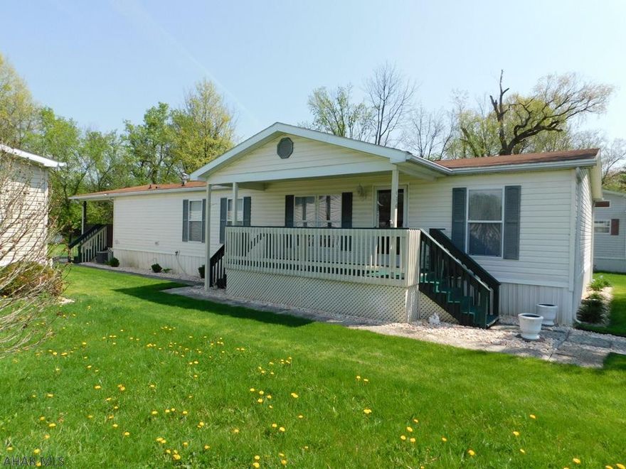 MOTIVATED AND LOOKING FOR OFFERS!!!  Here is your perfect, pristine property.  If you are ready for a quiet community this home is for you.  Very well kept, clean home with a fantastic kitchen and open spacious floor plan to entertain with your open concept family room, dining room and living room.  The master bedroom features a private master bathroom beautifully designed with a large garden tub.  Don't forget about your ability to set on one of your two porches to sip your morning coffee or enjoy the evening sunset.Lot rent include trash and snow removal. $392/mo           NEW carpet installed !! It is fresh and new and worth a 2nd look!!!!      STOP BY TO SEE THIS NEW LOOK!!