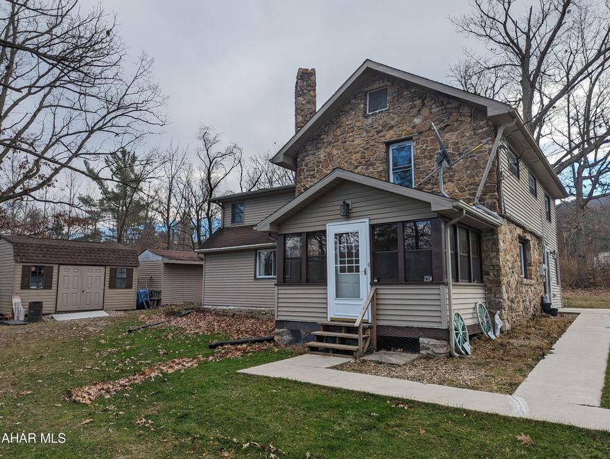 Stone and vinyl home on a large over 3/4 acre lot in easy access location in Greenwood area. home recently remodeled and is in move in ready condition. Pellet stove for heat savings and lots of rooms and square footage.