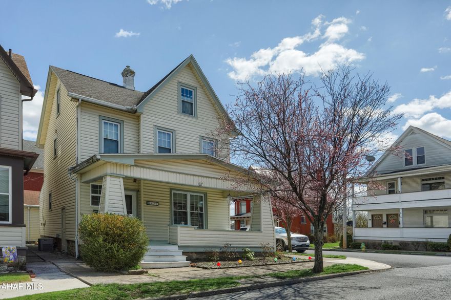 A spacious and charming 3-bedroom, 1.5 bathroom home in the desirable Fairview neighborhood on a corner lot. This beautifully maintained home offers 1,699 sq ft of living space with original hardwood floors, high ceilings, and a grand staircase that adds timeless character. The main level features large, light-filled living and dining areas, a well-appointed kitchen that opens to a screened-in porch, a convenient laundry area, and a half bath. Upstairs, you'll find three generous bedrooms, a full bath, and an additional finished attic that could be used a bedroom, office, playroom or whatever you desire. This property features a detached garage and year round parking located in the front and side of the house. Ideally located within walking distance to UPMC Altoona, this home blends classic charm with everyday convenience.