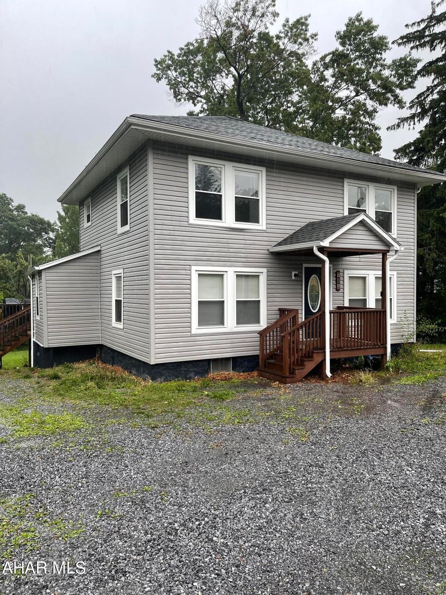 Updated 3 bedroom, 1 bath vinyl-sided home on a .34 acre lot.  Features a large deck, an updated kitchen, spacious bedrooms, modern flooring and a 200 amp electrical service