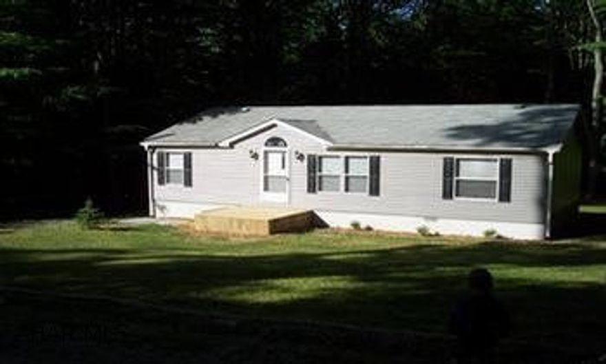 Like New 2002 Fleetwood 28x42 doublewide in Glendale year around.  Master bath with garden tub, eat in ktichen, central air, laundry room, private .75 acre flat lot, great deck in back, close to Rock Run Recreation area, access to inground pool, tennis & basketball courts & close to hunting & fishing.