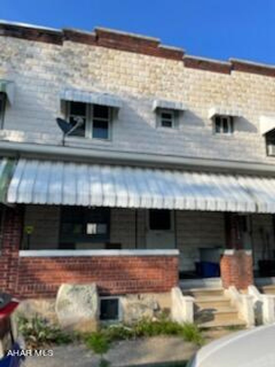 Investors Dream.  2 updated units side by side.  Each units boasts 3 bedrooms, one bath, with spacious living room and dining areas.  Excellent tenants. Properties at one time were approved for student housing. This may still be an option.