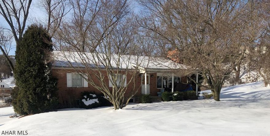 This one story home sits on a large 1.27 acre city lot. 3 bedroom 2 baths that offers eat in kitchen, dining room, living room with fireplace, hardwood floors throughout, , a recently remodeled basement with a family room that has new carpet and drywall and updated 3/4 bath, laundry room, and additional space for storage. I car integral garage, a rear screened in patio located beside an outisde patio that's great for entertaining and a new roof.