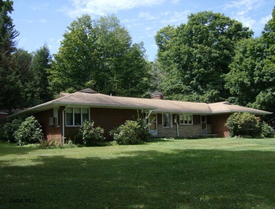 Approx. 3 Acre Wooded Lot w/Ranch Home and pool house. Enjoy being close to nature in this 1-level home. Discriminating tastes can appreciate the outstanding Cherry, Oak and Ash wood, as well as stone work through out the home. Lots of room to entertain! By Appointment Only. Only Approved Buyers Per Seller's Request.