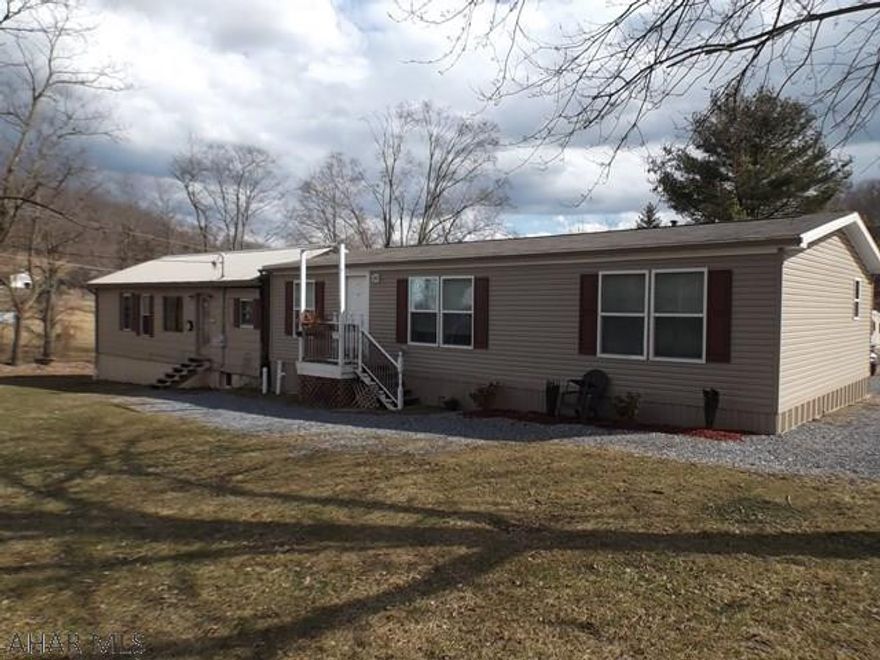 44x28 Double wide with tie downs 18.6x38 room from original house that had a fire. With full basement. Private Rd with 15' right of way. Not in flood zone Two creeks around property and unique covered bridge.