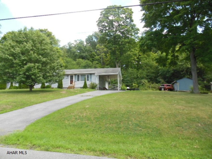 One story with 3BR, 1BA, 2 car attached garage, carport and more on 3/4 of an acre of ground. Vaulted ceiling in dining room, fireplace in basement (wood), appliances, ceiling fans, Burnham boiler with integrated hot water tank. High steps to basement - please watch!  No key yet for the garage, but forthcoming...  (*Agents check private comments.)