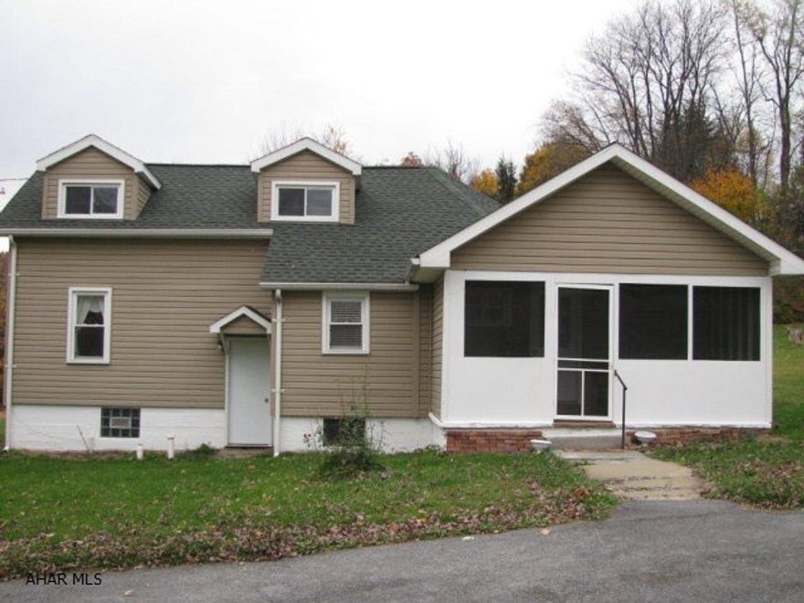 Bellwood ranch home on 1.2 acres! Newer roof, vinyl siding, thermopane windows and new carpeting thru out. First floor includes an Eat in kitchen, updated bath, laundry, spacious living room and 2 bedrooms. Second level offers a master bedroom with walk in closet with built ins!