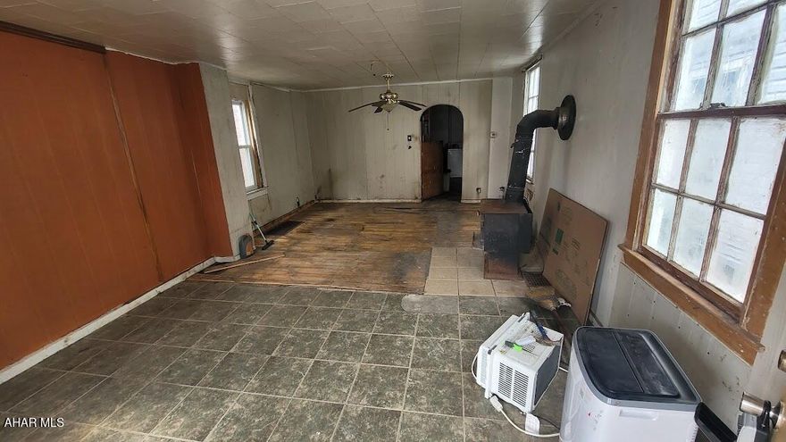 HIGHEST AND BEST OFFER DUE BY TOMORROW TUESDAY APRIL 7TH 2026! INVESTMENT OPPORTUNITY! MOTIVATED SELLER! This 3 bed 1 bath home has laundry on the first floor, a fenced yard, and the perfect size to maintain. The roof is approximately 10 years old and furnace is approximately 5 years old. All utilities are on. Appliances and personal items are all negotiable! Come check out your next investment property! Home is a fixer!