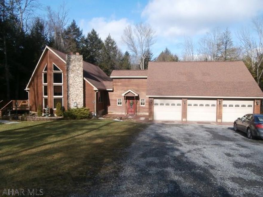 Fabulous 1.5 story home with attached oversized 3 car garage. Oak EI kitchen, Large living room with vaulted ceiling and fireplace, 1st floor master bedroom with large bath , Family room with separate entrance from foyer. Quality built home includes three lots.