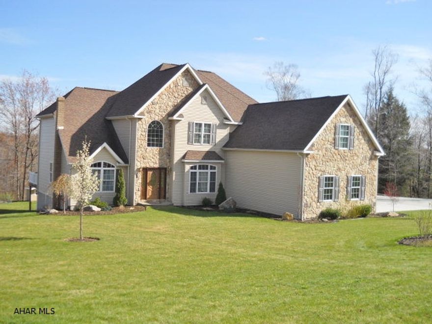 Beautiful custom built home with 9.6 acres of land that borders state game lands. This home has it all! 5+ bedrooms, 4 baths, great room, formal dining room, butler's pantry & more. Relocation riders needed with all offers.