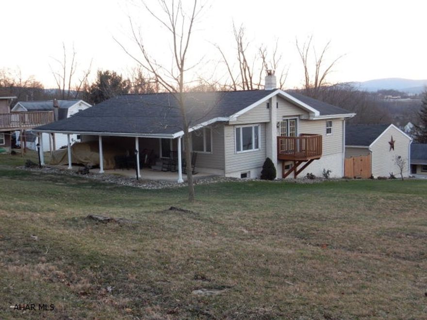 Wow, a spacious home with a ton of storage. This home has been kept, maticuously and totally converted into a great home.  Separate 24 x 24 heated garage with additional furnace.  Also contains a 2 bay carport.  Cute brick patio, with private hot tub area.  Great views from the 2 decks, one of the mountains, one for the fireworks which over look our local minor leage ball park and amusement park.  Perfect location for schools and shopping, just minutes away from it all.  Please open each door and investigate, just a little further.  There are many hidden features in this home. Walk in closet with dressing room, hidden pantry and more.   Owners prefer showings after 3:00 p.m. due to work schedules. Price reduced 10 K.  Will help with closing costs.