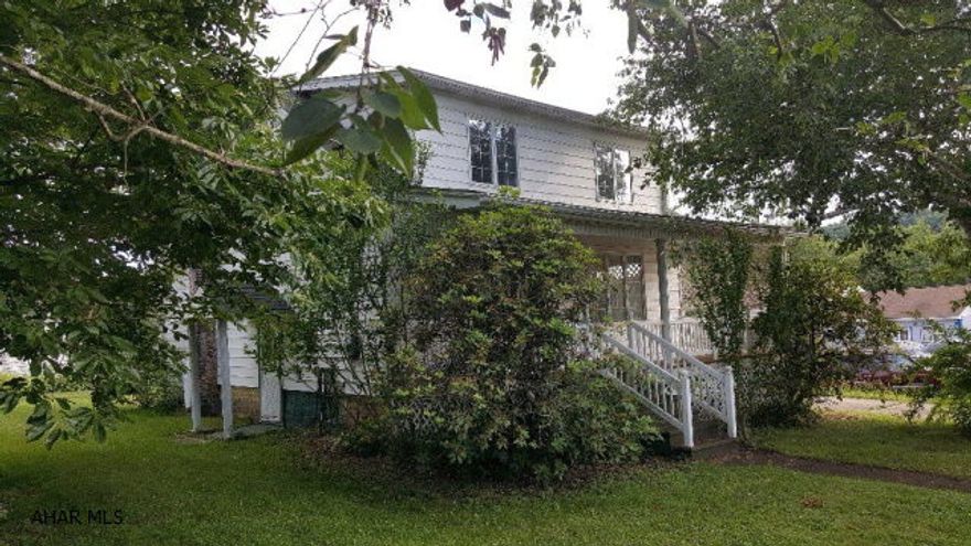 Charming 2 story home with 2 car garage in Coalport. This 3 bedroom and 2 bath home is move in ready. Garage and shed need a little TLC but there are lots of possibilities with bonus room above garage. Front and back porch are covered. Lots of off street parking!