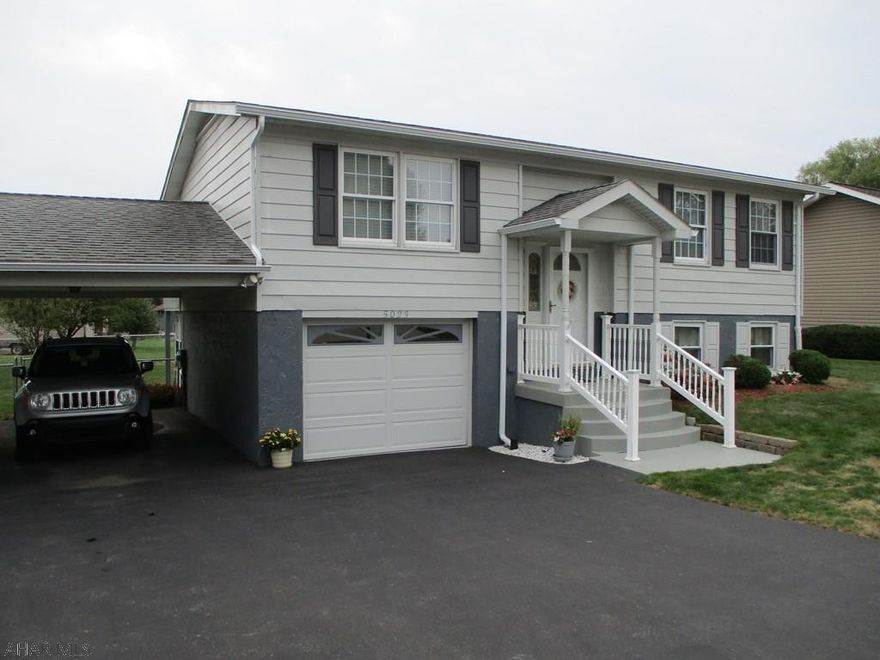 Extremely well kept, bright and cheery bi-level in Eldorado.  Newer vinyl thermopane windows, roof and spouting.   Kitchen recently upgraded with beautiful Oak cabinets featuring self closing doors, soft close drawers, roll out shelving and Quartz Counters.  Heated 1 car garage with work area, separate carport, laundry room and 1/2 bath off family room.  Detached propane fireplace in family room.  Yard is fenced, mostly level and there is an oversized stickbuilt shed .  Spacious covered deck off dining area and enclosed sunroom created for a garden room.  Central A/C, newer flooring throughout.  PLEASE REMOVE SHOES WHEN ENTERING.