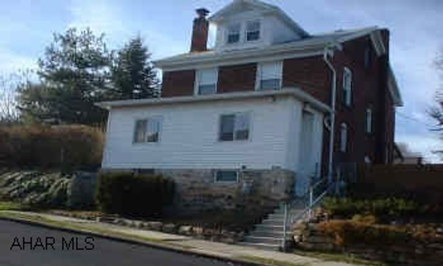 Brick home with lovely eat in kitchen. 2 car garage with workshop.   Large 3BR home on beautiful and spacious lot.