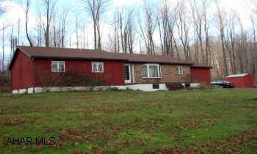 BEAUTIFUL 3 BEDROOM, 2 BATH RANCHER SITTING ON 7.8 COUNTRY ACRES! WELL BUILT NEWER HOME, NEW FURNACE, WOOD FIREPLACE, ZONED HEAT, GARAGE CONVERTED TO FAMILY ROOM.  IMMACULATE RANCHER WITH 3 BEDROOM AND 2 BATH. LOTS OF ROOM. SITS ON SECLUDED 7.8 ACRES. NEW FURNACE, WOOD FIREPLACE, ZONED HEAT, CENTRAL VAC HOOKUP, GARAGE CONVERTED TO FAMILY ROOM, PRICED TO SELL.