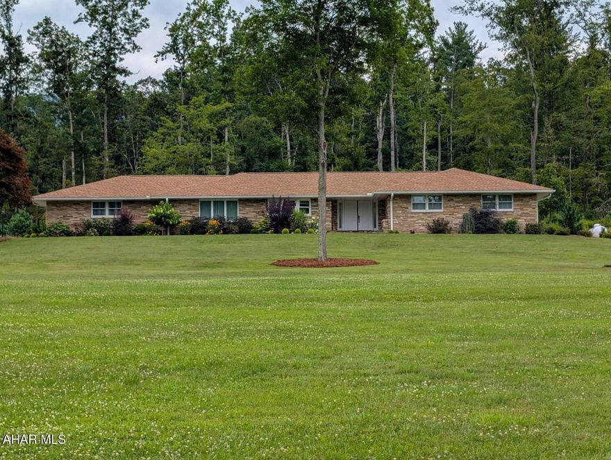 Discover Luxury Living on 10 Private Acres.

Experience a level of craftsmanship rarely found with this exceptional estate nestled on 10 pristine acres, ideally located between Bedford and Cumberland and just minutes from the scenic shores of Lake Gordon.  Within 15-20 minutes, you can be at Rocky Gap, Bedford Omni Springs, and Western MD Hospital.   Every inch of this remarkable three-bedroom, four-bath home (2 full, 2 half) has been meticulously remodeled to deliver an unparalleled living experience.

Inside, you'll find custom doors and trim throughout, paired with rich new flooring and elegant custom draperies. The heart of the home is a gourmet kitchen featuring bespoke cabinetry, luxurious granite counters, and top-of-the-line Thermador appliances -- perfect for both everyday living and entertaining.

Enjoy peaceful moments in the sunroom, bathed in natural light and offering tranquil views of your private grounds. It's the perfect spot for morning coffee, a good book, or gathering with friends.

The primary suite is a true retreat, boasting a spa-like bath with a custom walk-in granite shower and soothing heated floors. Every full bath - and even the laundry - features custom cabinetry that seamlessly blends style and function.

A partially finished basement adds valuable living space, ideal for a recreation room, gym, or hobby area. Two beautiful fireplaces create cozy gathering spots, while a whole-house generator, upgraded insulation, new windows, roof, electrical, plumbing, 2 propane tanks (owned) and state-of-the-art heating and cooling systems with 2 gas furnaces, 2 AC units and 2 hot water tanks ensure comfort and peace of mind in every season.

Outside, your 10 acres are a private playground for relaxation or exploration. 12 x 24 outbuilding with a 9x7 insulated garage door and  50 amp electric service.  Whether you're enjoying your morning coffee in the sunroom, hosting gatherings on the expansive property, or heading out for a day at Lake Gordon, this estate offers a lifestyle few can rival.

Homes of this caliber simply don't exist everyday - don't miss your opportunity to own a true masterpiece.  Pre-approval required prior to showing. Shown by appointment only.