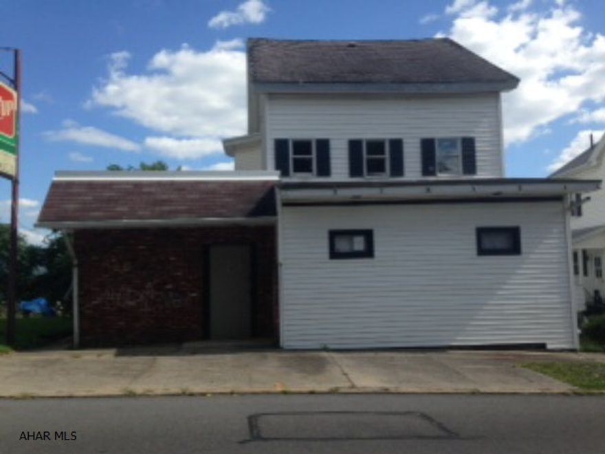 Many possibilities. Former bar/restaurant. Owner was in the process of working on the bar/restaurant area. This could be 2 rental units. Needs some TLC. There are no water lines.