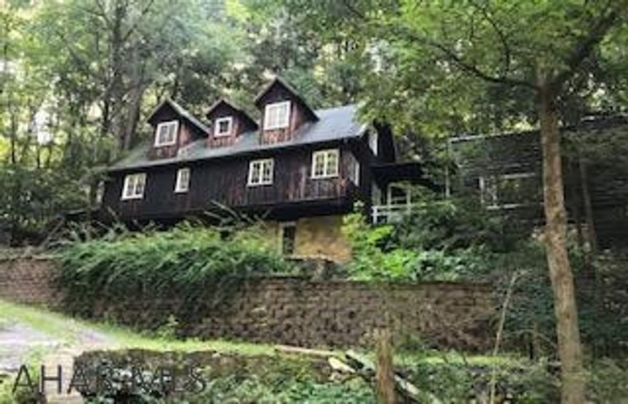 This unique home built in 1940 has great bones!  Frank Lloyd Wright style with a combination of artsy, vintage with lost of wood and natural light.  Convenient yet private.  Property has a spring and walking distance to Juniata River for those that like to fish.  Perfect for those that love nature and want to work at home in the huge office and art studio.  This home is for the creative that love something different!  New well installed by Ritchey Dec 2019.  Sq Ft is estimated.