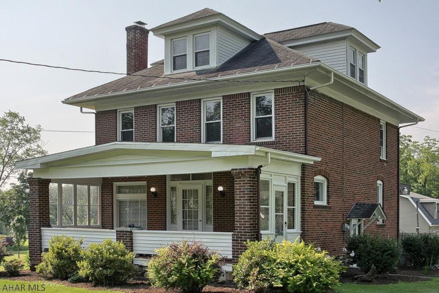 This beautiful early century brick home is within the highly desired Hollidaysburg School District as well as conveniently locationed right off I-99. With over 2,400 sqft, this valley home features hardwood floors, a gas fire place, large windows for natural lighting, and a 4th bedroom on the main level with a private bath. Venture onto the 2nd floor, with find 2 bedroom, a full bath and a master bedroom with large walk-in closets. Enjoy your own private level with bath on the 3rd floor of this large home. Then come outside and sit comfortably on the covered porch enjoying the view of the just under one acre of manicured ground  with mature trees, blossoming flowers and a bubbly coy pond. This truly is a dream abode for the growing family.