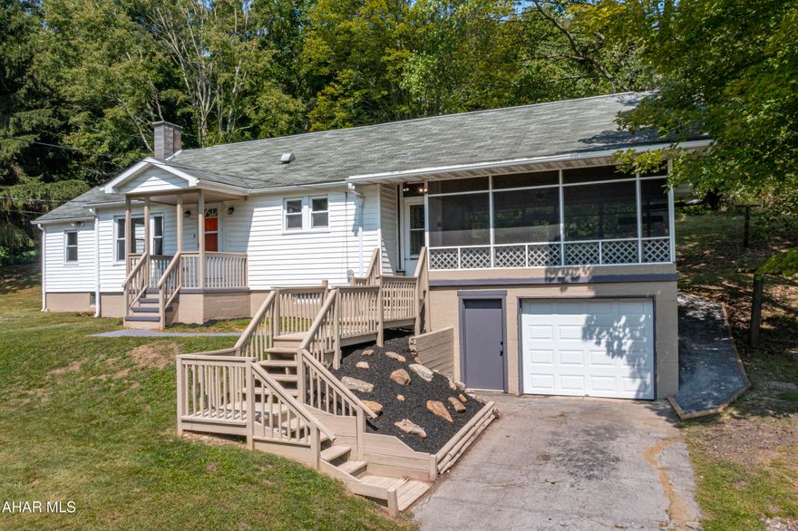 ''Newly updated ranch home nestled on 1.9 acres in the desirable Hollidaysburg Area School District. This charming home features 3 bedrooms, a beautifully remodeled full bath, and a convenient half bath in the basement.  The open concept design seamlessly connects the kitchen and living room, creating a spacious and inviting atmosphere.  The
 kitchen boasts new stainless-steel appliances, including a refrigerator and range/oven, complemented by granite countertops and stylish laminate flooring.  Hardwood floors flow throughout the rest of the home, adding warmth and character.  Relax and unwind on the expansive screened porch, perfect for enjoying peaceful evenings.  With a large basement offering plenty of storage or finishing potential, a one-car integral garage, a 2-car carport, and two driveways, this home has it all! Don't miss out on this opportunity to experience comfortable country living with modern amenities.''