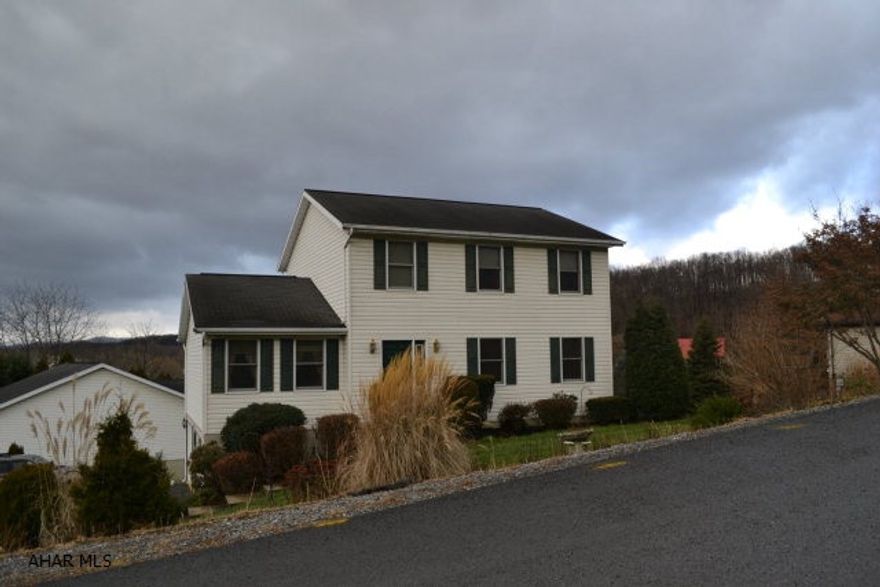 Large 2 story home in the Bellwood School district.  Features 3 Bedrooms, 2.5 baths, large family room, EIK, dining room and formal living room.  Close to I99!  Home warranty included.