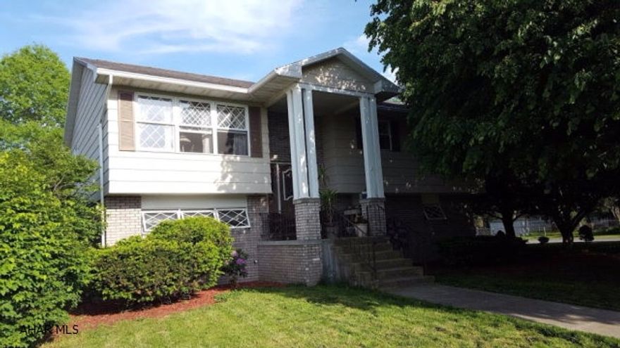 Settle into this wonderful neighborhood in a spacious, split entry home on a quiet street.  This 3 bedroom, 2.5 bath home has been beautifully maintained.  The bathrooms have been recently updated and the windows are thermopane.  The family room has a beautiful brick fireplace and a bar for entertaining.  There is also access to the patio area outside the family room.  The shaded corner lot has mature trees and landscaping.  You have to see this one to fully appreciate what a wonderful home it is!