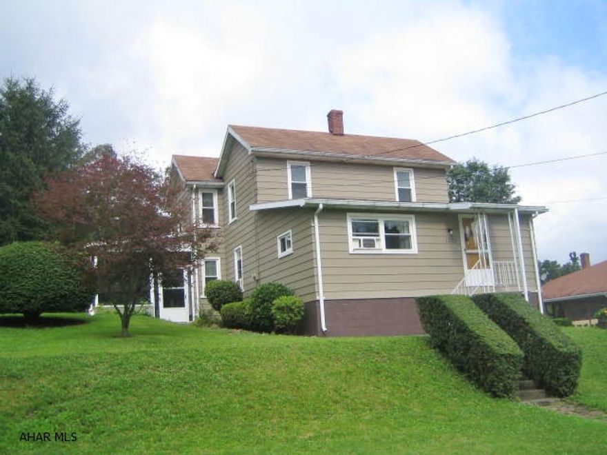 Immaculate 2 story Eldorado home on 1 acre lot. Many updates including beautiful newer kitchen with center island, 2 full baths including newer first floor bath. First floor laundry/mudroom and large family room. Relaxing screened patio plus large covered patio. Huge 2 car detached garage with work shop area, openers  and walk up 2nd floor storage. 1 year home warranty included.