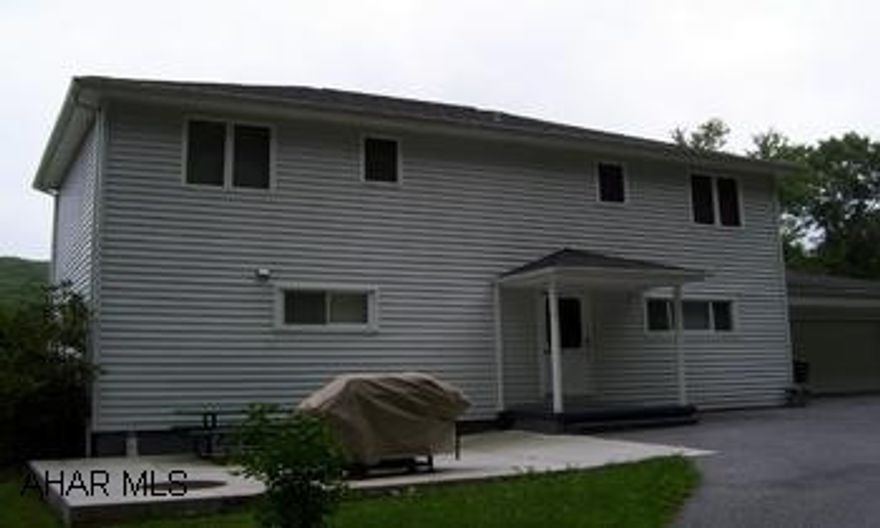 I'm spacious inside & outside! 3BR, 3 bath , 3+/- peacful acres, 2 car garage. One of the most enormous master bedrooms you have ever seen. Complete with a master bath and its own red-heart shaped jacuzzi tub. Holding tank $35.00 monthly, low taxes, above ground pool. Call Tracy 937-8197.