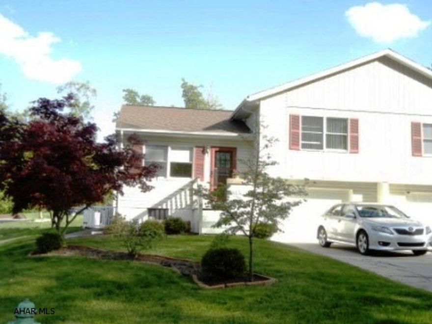 This meticulously cared for home is one of the larger 1/2 double's on Timberline Dr. From your 3 seasons room, enjoy the beautiful yard,landscaping and fenced-in area, nestled in a wooded setting. This bright and cheery house features new roof, bay window, vaulted ceilings, and updated kitchen and bath. This home definatly brings the outside in. Family room and 3rd bedroom in lower level.Electric has time of day saver system.