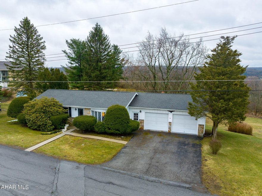 Open House, Saturday 4/29/23, 1-3 p.m. 
Only a 12-minute drive from Altoona's Logan Valley Mall.  Well maintained, 1-story home on 1.2 acres.   Located across the street from Signature Park in Gallitzin. Features include 3 bedrooms; 2.5 bathrooms; a large, heated, 2-car garage (23.83' x 27.42'); beautiful hardwood floors; a covered back porch; a finished basement; hot water heat w/4 zones; and an open floor plan (kitchen/dining/living).  This property is located in the Penn Cambria School District.