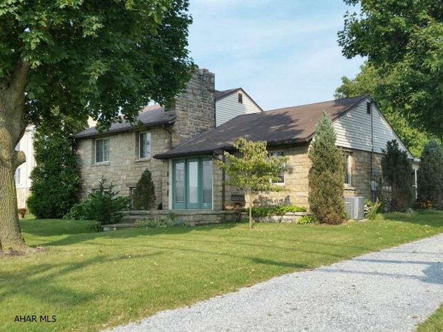 4 Bedroom, 2 bath stone home with kitchen and stainless steel appliances, family room with fireplace, formal dining room, hardwood floors, 29 x 31 outbuilding salon in back has a variance, 1/2 bath, separate heat, water and sewer, and electric. 1 Peach, 2 apple trees. Storage shed and open wood shed.    #J-306