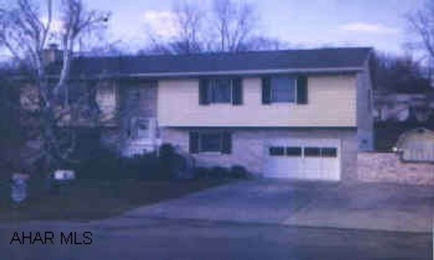 Spacious bi-level in super neighborhood! Central air, garage, above ground pool.