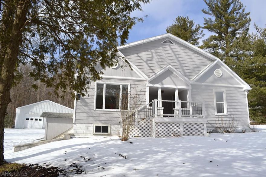 Adorable home totally refinished, large bedrooms with large closets!! Beautiful quartz counter tops. Loads of privacy with large yard. Huge garage with a beautiful setting!! Brand new septic systems has been installed!!