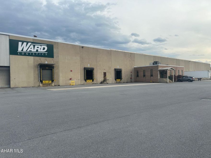 For Comparable Purposes Only. Warehouse facility with offices and rail.