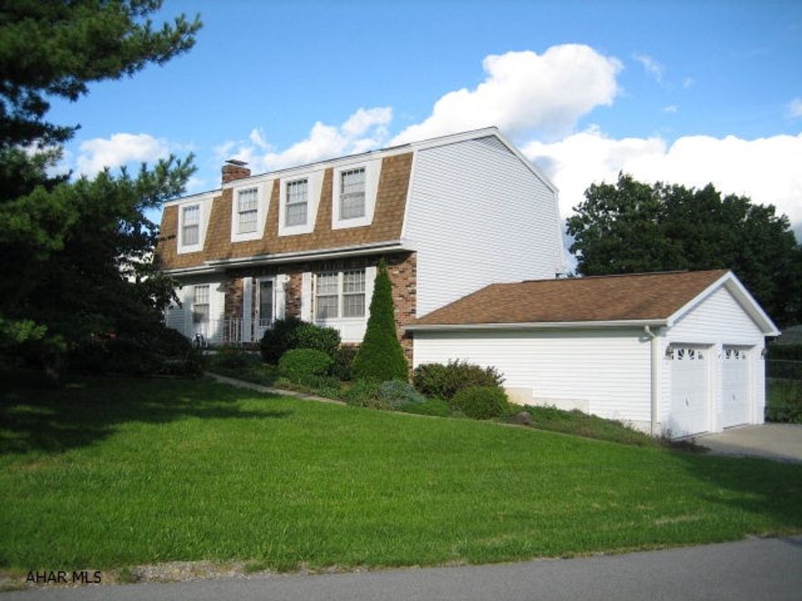 Move in ready. 3 bedroom - office or storage area, eat-in kitchen with cherry cabinets, 1st floor laundry, sun room, gas fireplace in family room.